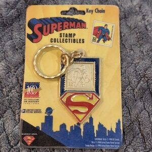 vintage 1998 Superman "Stamp Collectibles" keychain featuring a metal replica